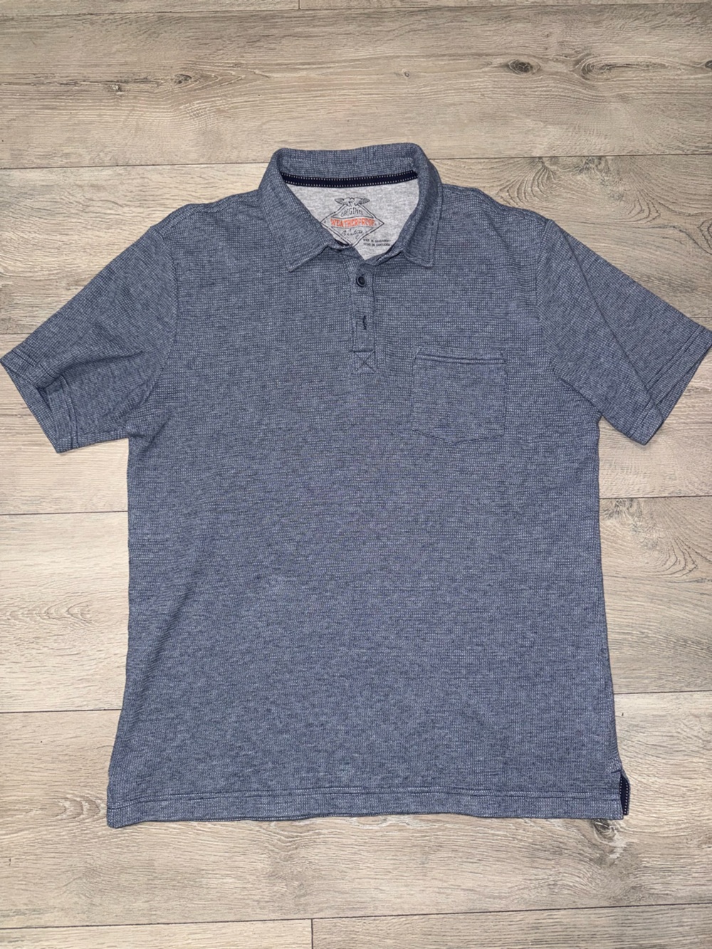 Weatherproof Heathered Blue Short-Sleeve Polo with Chest Pocket